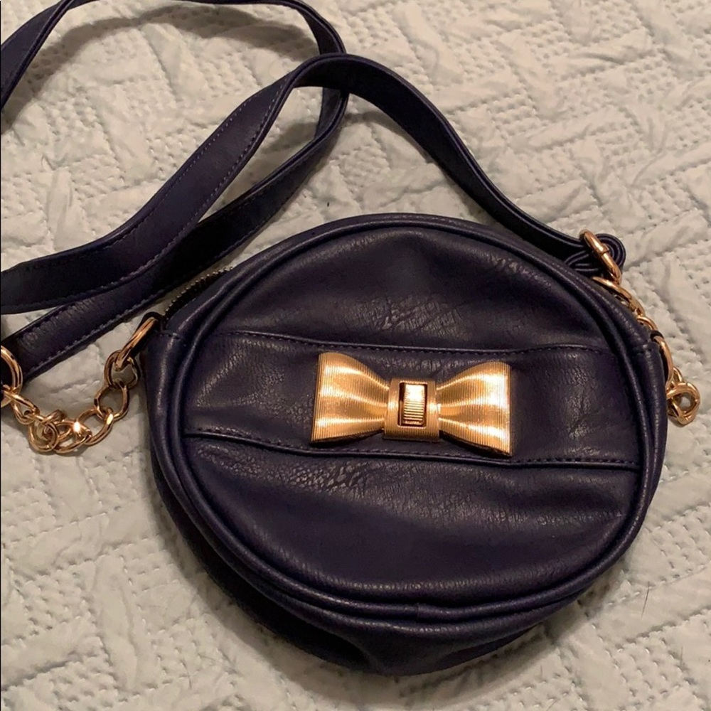 Small blue and gold circle crossbody